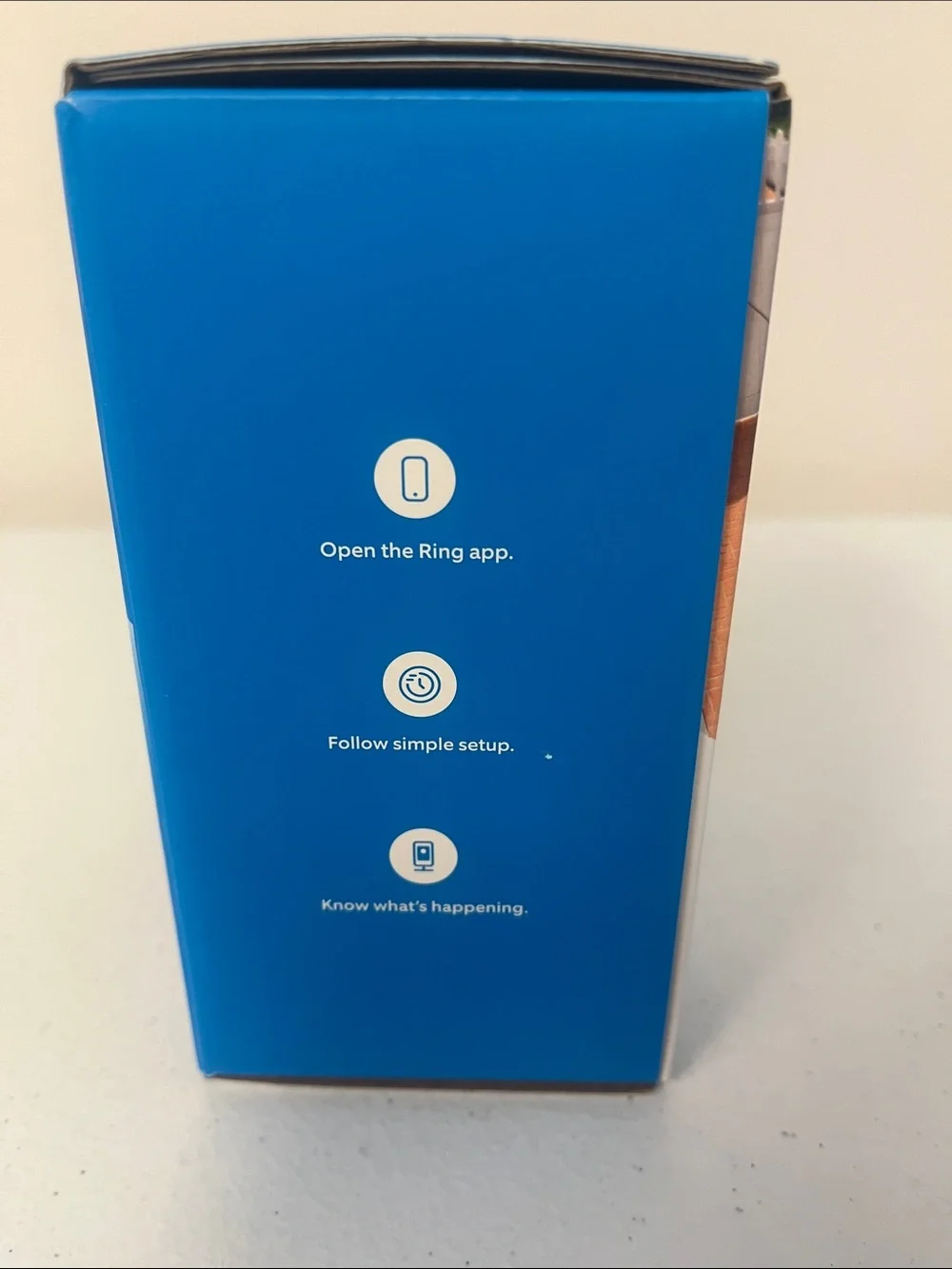 Ring Outdoor Cam Plus in black and blue packaging